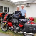 Couple with vintage red bikes